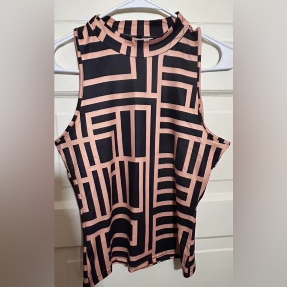 Woman’s tank top being and black